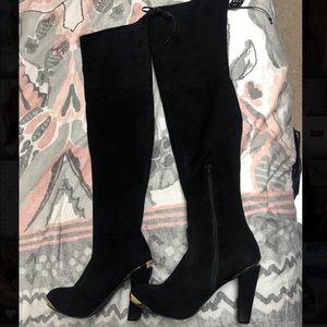 Over the knee heeled boots